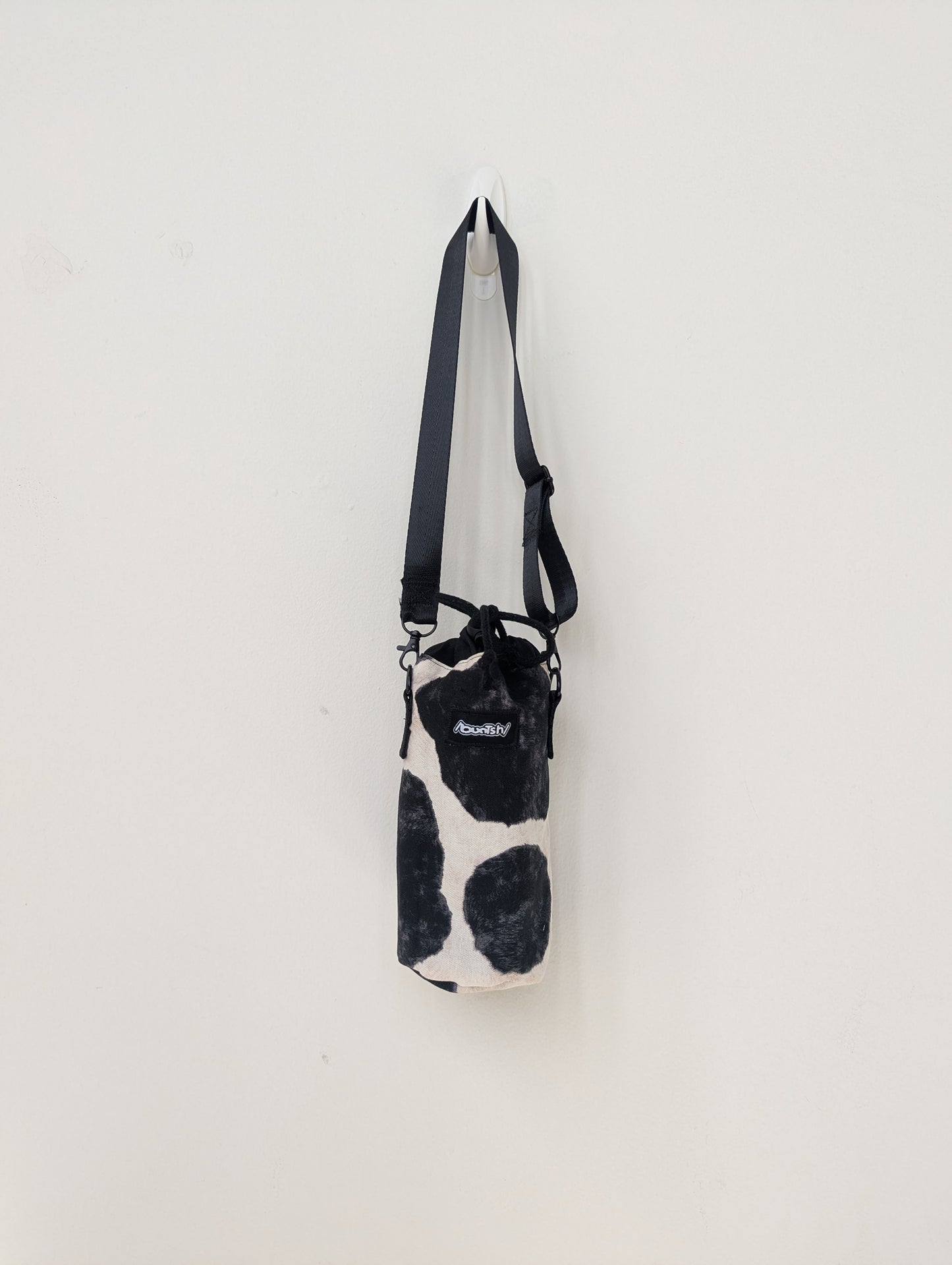 1of1 Handcrafted Cow print, Circle backpack & Water Bag Set